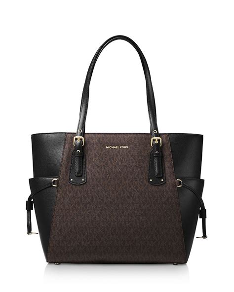 michael kors voyager signature east west tote brown|Michael Kors voyager tote.